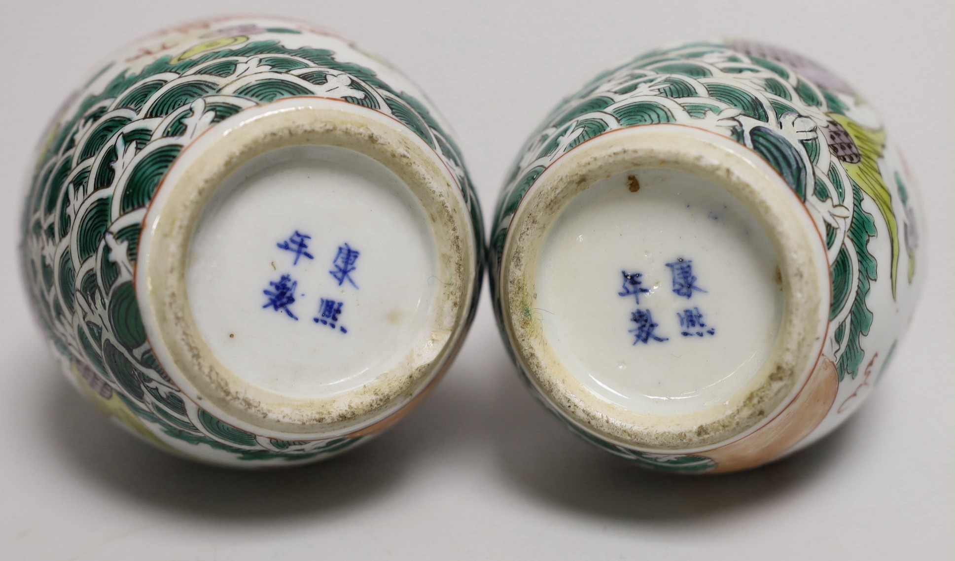 A pair of Chinese enamelled porcelain ‘dragon’ bottle vases, Kangxi marks probably Guangxu period, 15cms high (a.f.)